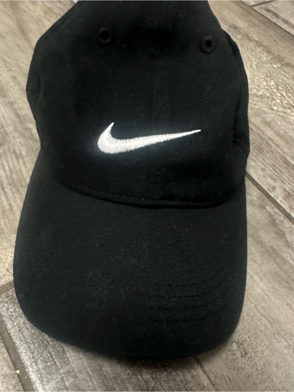 Nike Black Cap with White Swoosh Logo